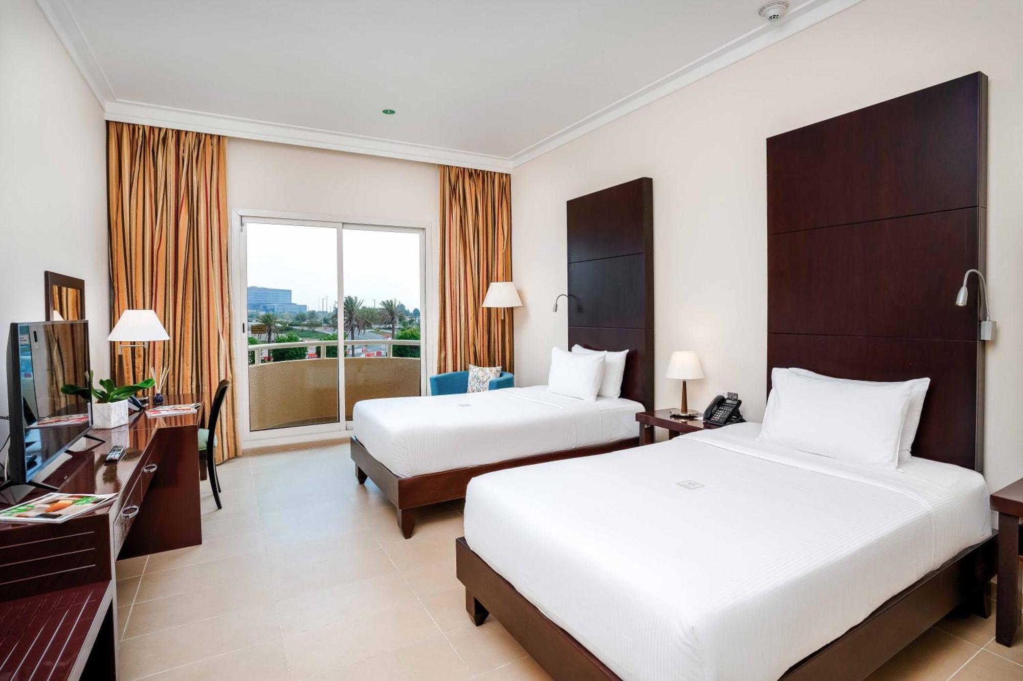 Metropolitan Al Mafraq Hotel Abu Dhabi Exterior photo